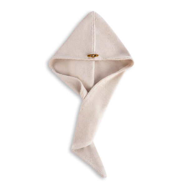 Zdjęcie przedstawia turban do włosów w kolorze kremowym.